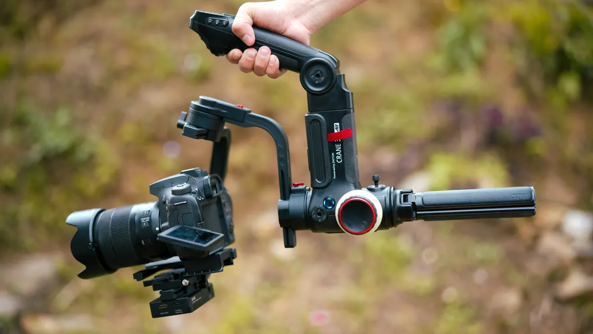 Handheld camera gimbal with camera