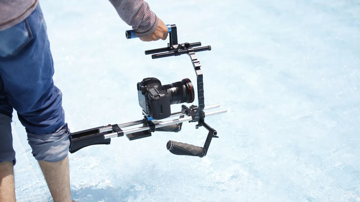 How to calibrate a gimbal for smoother footage camera mounted on a handheld gimbal outdoors